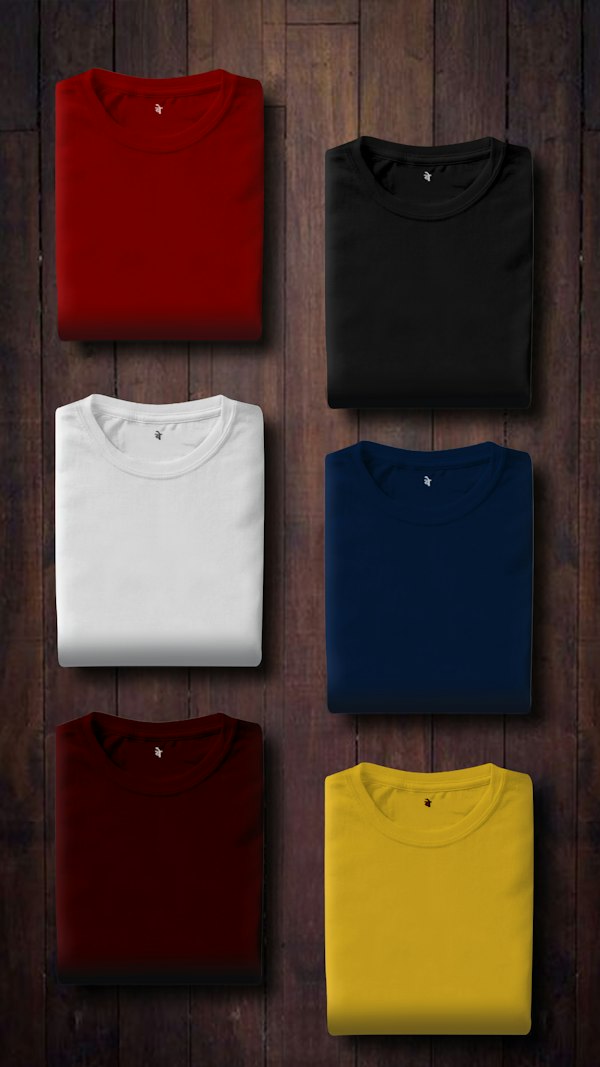 White tees hanging in store